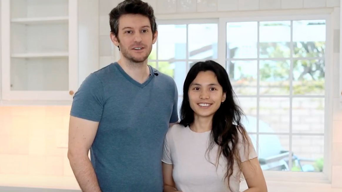 Happy couple in their new home